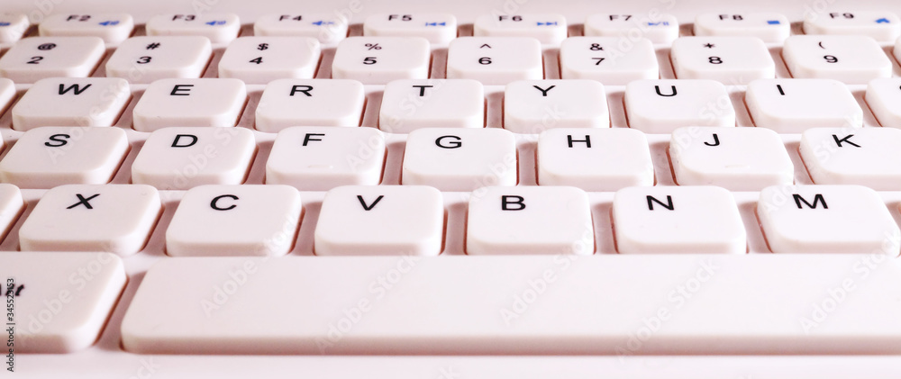 White computer keyboard close up.