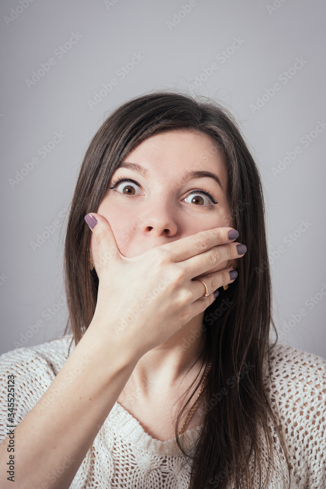 girl covers her mouth girl covers her mouth