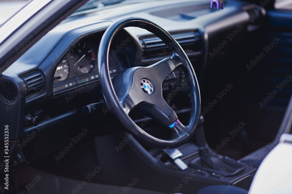 BMW M3 e30 interior, steering wheel, dashboard. Stock Photo | Adobe Stock