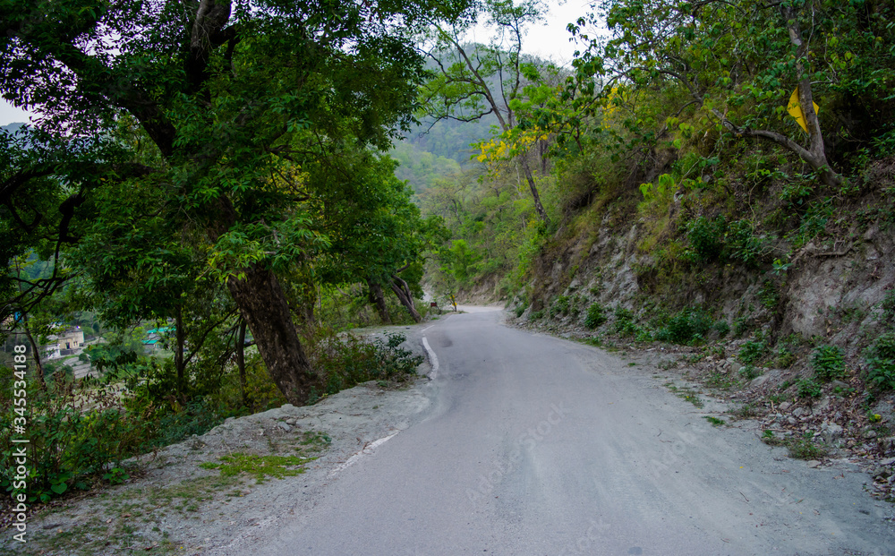 Roads between mountains of Rishikesh valley, Located in the foothills of the Himalayas in northern India.
Roads between mountains of Rishikesh valley, Located in the foothills of the Himalayas in northern India.