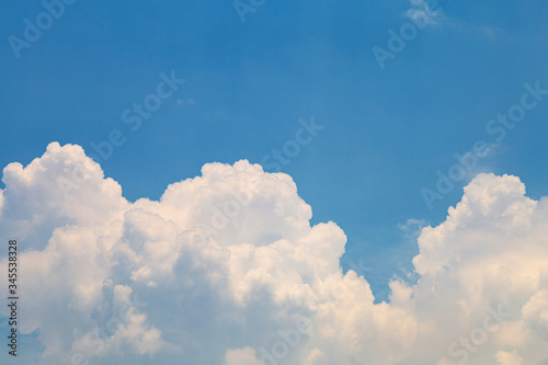 Fototapeta Naklejka Na Ścianę i Meble -   white fluffy clouds in blue sky in summer day.