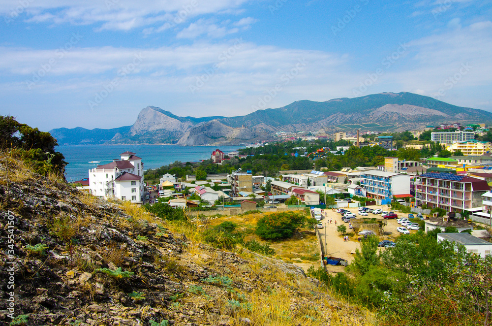 SUDAK, CRIMEA - August, 2019: City view from the hill