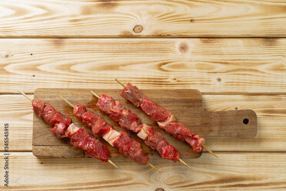 Raw turkish traditional meat kebab on the table. Close up.