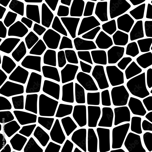 The skin of a giraffe. Black and white vector seamless pattern.