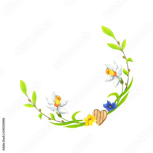 A wreath of daffodils, green branches, a blue and yellow flower and a wooden heart.