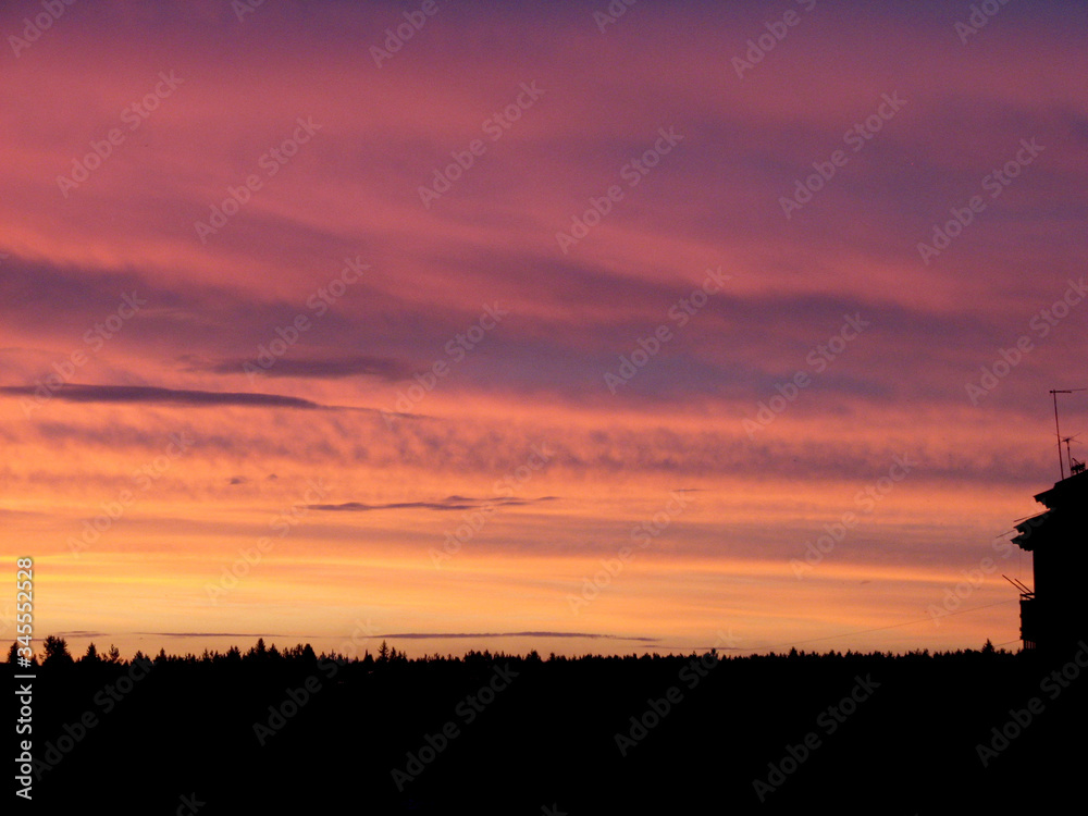 Sunset in a village in western Siberia in Russia