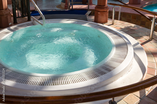 A modern hot tub in a luxury patio or spa