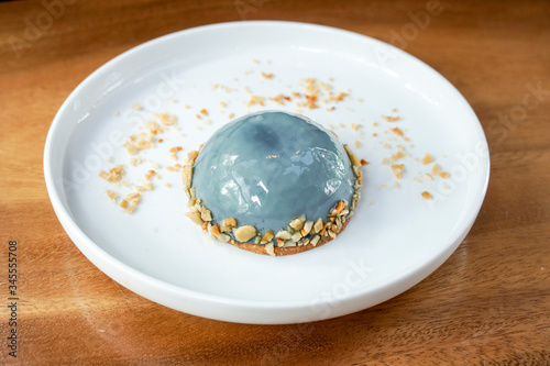 Earl Grey Mousse Cake in white plate.