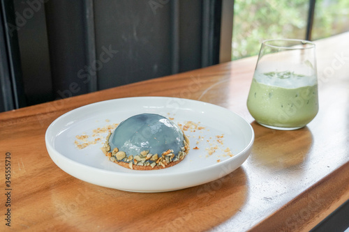 Earl Grey Mousse Cake in white plate.