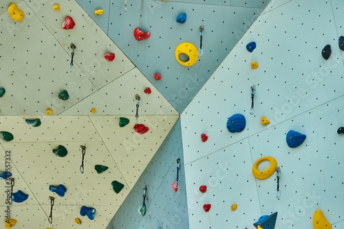 Detailed view of the fixing points and lugs of a climbing wall