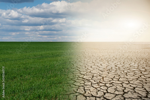 Landscape with half green field and half desert. Global warming concept