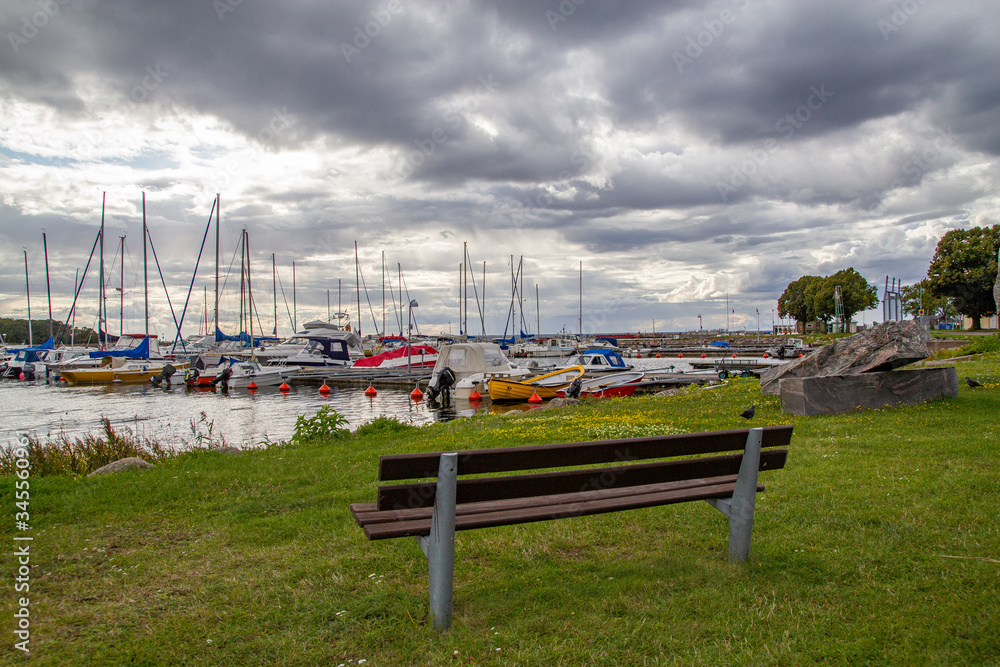 Lovely and cozy view on the water and boats with dynamic sky Lovely and cozy view on the water and boats with dynamic sky