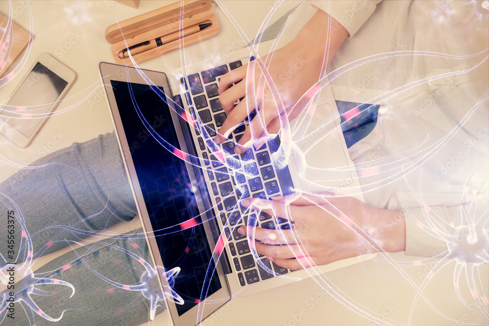 Double exposure of woman hands working on computer and neuron hologram drawing. Top View. Science concept. Double exposure of woman hands working on computer and neuron hologram drawing. Top View. Science concept.