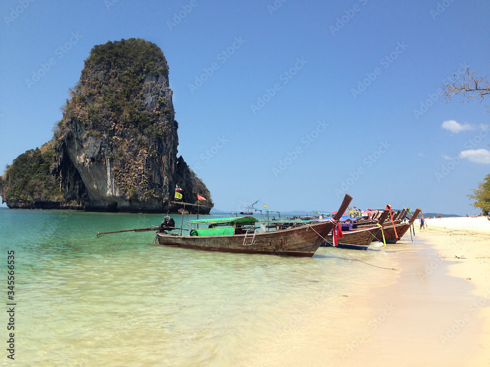 Fototapeta premium Poda Island Krabi Thailand. Long tail boat on tropical island