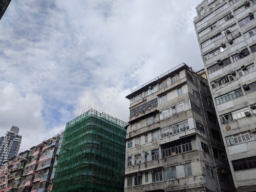 old building and bamboo building site  in hong kong