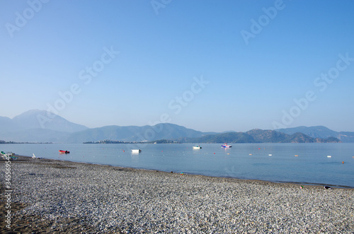 Morning on the Calis Beach on the Aegean Sea photo