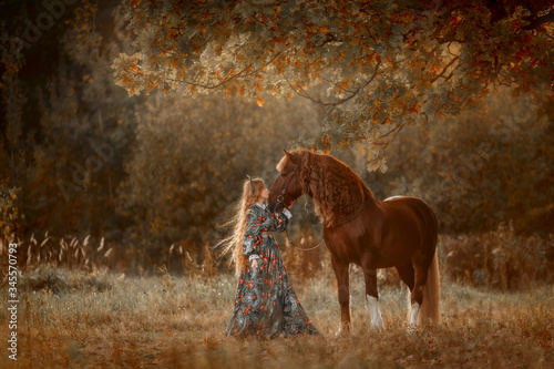 Canvas Print Beautiful long-haired blonde young woman in national russian style with red Vlad