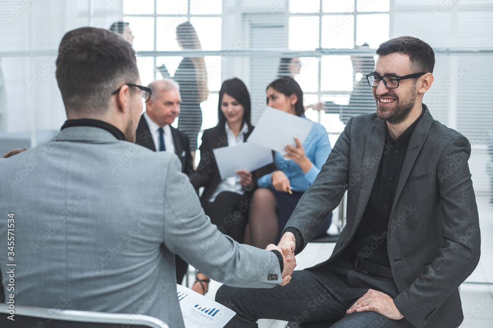 close up. business people shaking hands in agreement close up. business people shaking hands in agreement