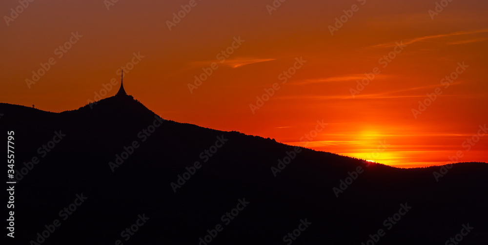 Silhouette of Jested mountain at sunset time, Liberec, Czech Republic. Panoramic shot Silhouette of Jested mountain at sunset time, Liberec, Czech Republic. Panoramic shot