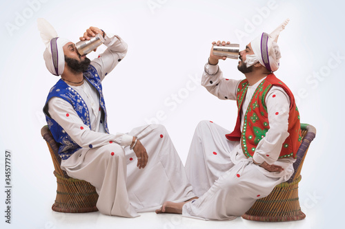 Sikh People drinking Lassi during Baisakhi celebrations 