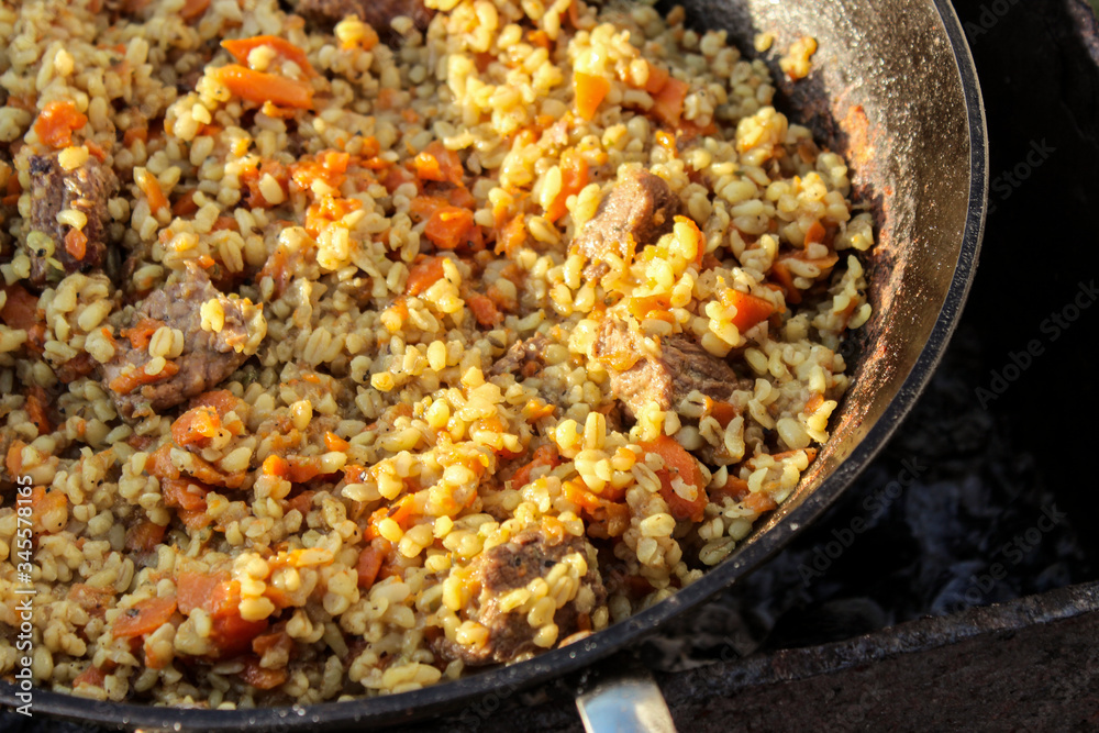 Pilaf in a cauldron