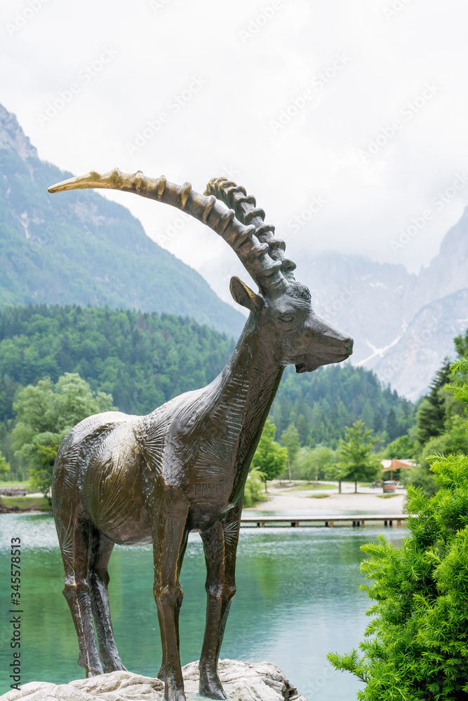 Bronze capricorn at Jasna lake in slovenia