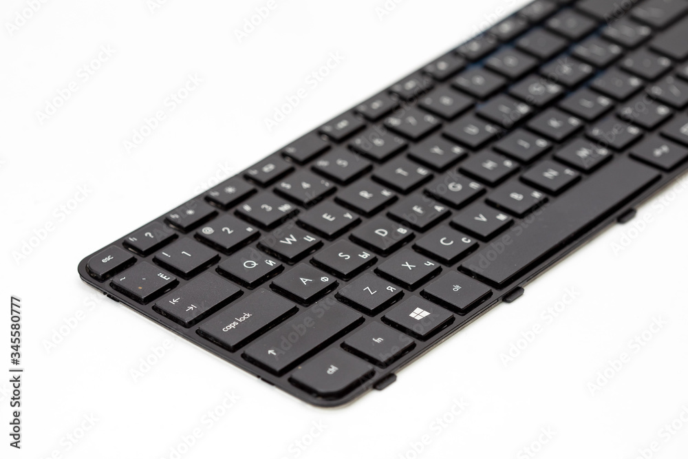 black laptop keyboard on white background