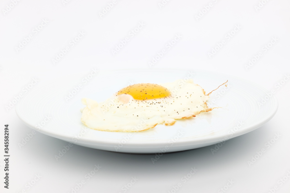 Fried eggs on a white background Fried eggs on a white background