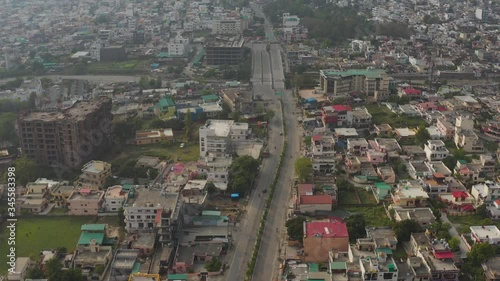 Dehradun, Uttarakhand/India- May 2 2020: World disaster . Coronavirus 3 Lockdown in India. Aerial views of empty roads , shops closed in india uttarakahnd dehradun   .  Aerials 4k photo