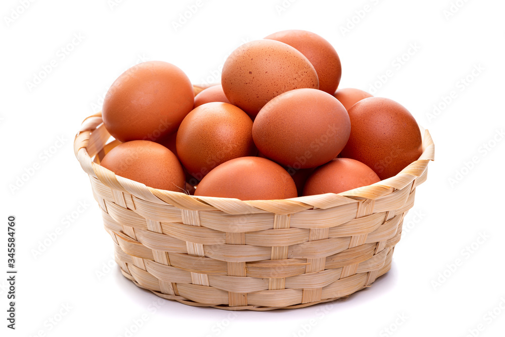Eggs in a wicker basket. Isolate on white background
Eggs in a wicker basket. Isolate on white background
