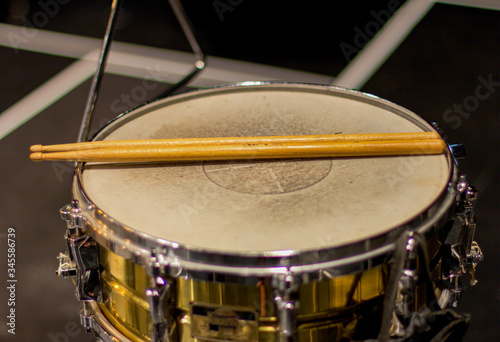 drum and drumsticks. percussion instrument.