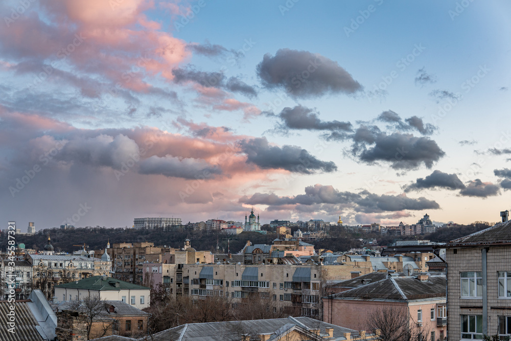 Stunning view on the city in Kyiv and Saint Andrew's Church during the sunset Stunning view on the city in Kyiv and Saint Andrew's Church during the sunset