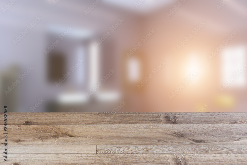 Empty interior with large window. Retro light bulb. The floor is of brown parquet. 3D rendering. wooden table. blurred background Empty interior with large window. Retro light bulb. The floor is of brown parquet. 3D rendering. wooden table. blurred background