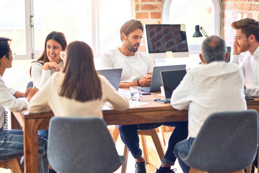 Group of business workers working together at the office