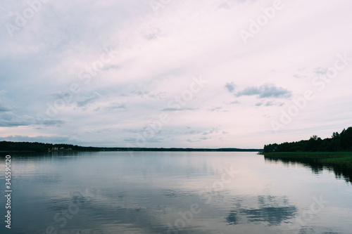 smooth lake and banks with grass