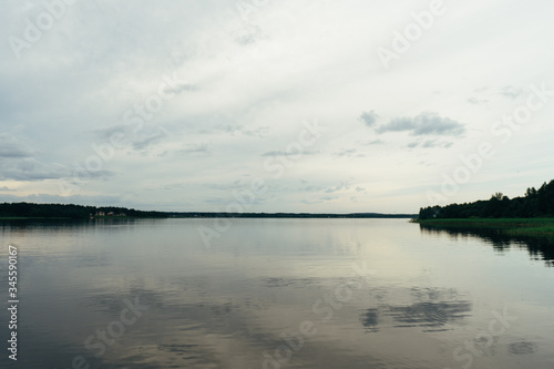 smooth lake and banks with grass