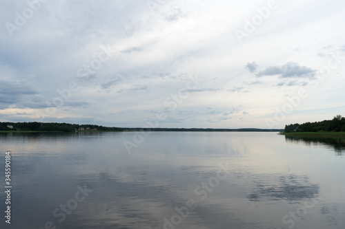 smooth lake and banks with grass