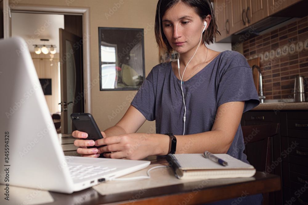 Asian Woman freelancer lecture and working on laptop at home. Asian Woman freelancer lecture and working on laptop at home.