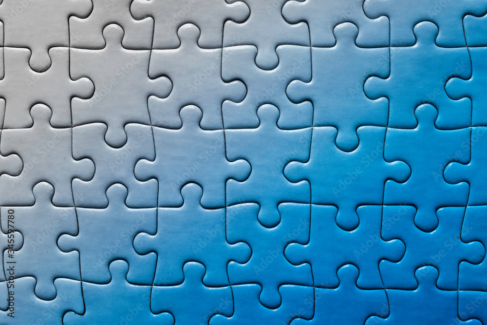 Blue pieces puzzle degraded from right to left Blue pieces puzzle degraded from right to left