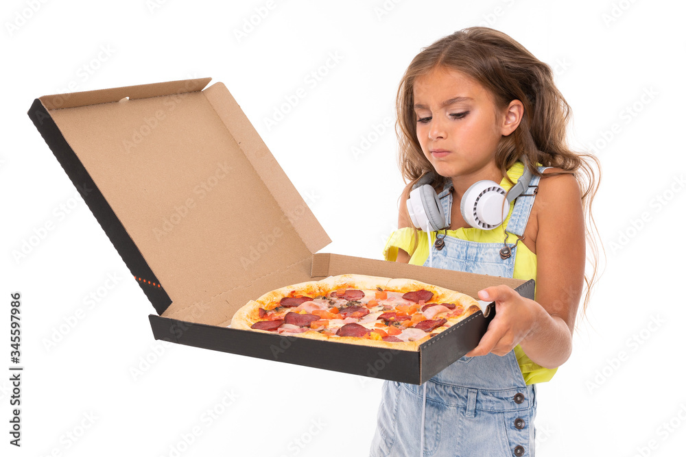 attractive girl holds an open box with hot pizza on a white background