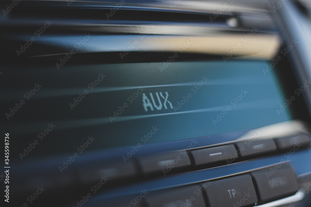 car radio with aux function. bokeh background car radio with aux function. bokeh background