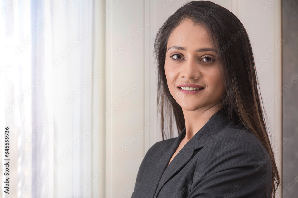 portrait of happy businesswoman in office
portrait of happy businesswoman in office