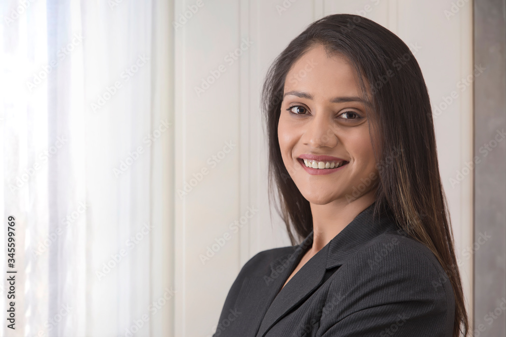 portrait of happy businesswoman in office
portrait of happy businesswoman in office