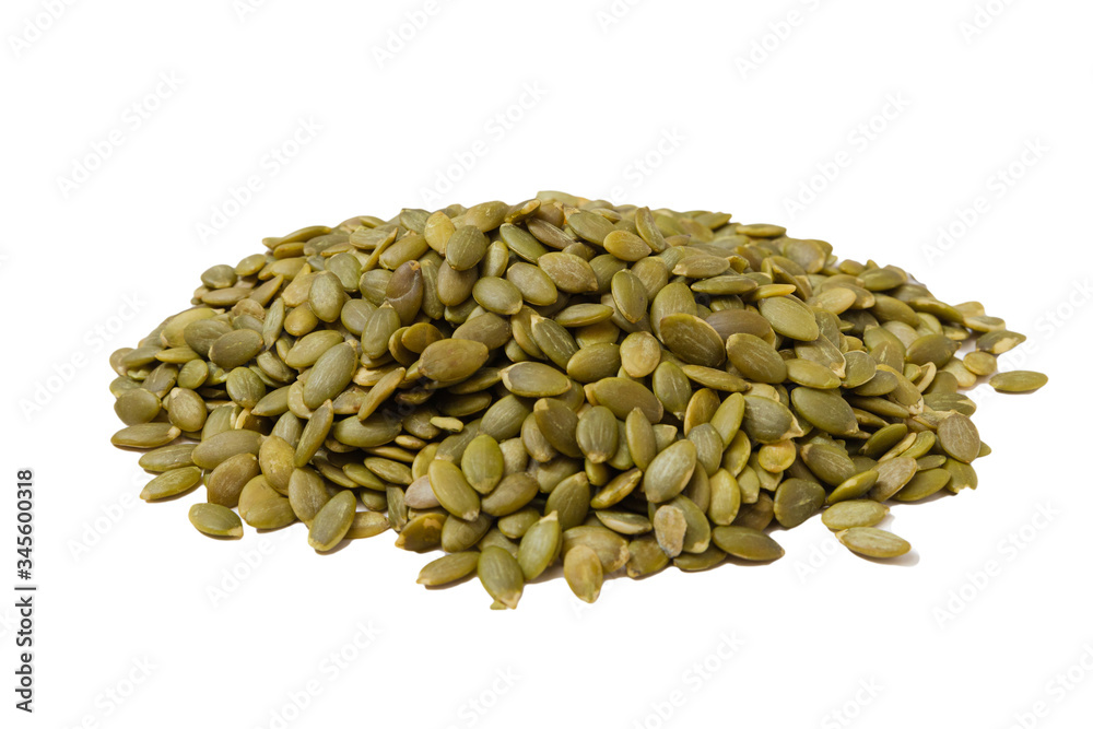 Peeled Pumpkin Seeds. Unshelled kernels. Isolate on a white background. Peeled Pumpkin Seeds. Unshelled kernels. Isolate on a white background.