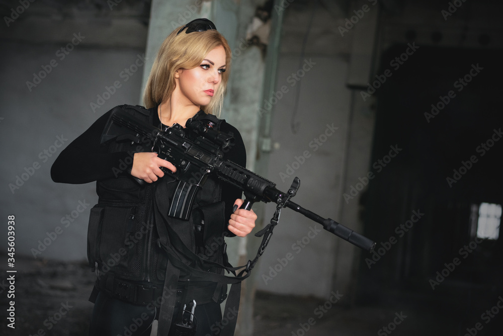 Special force agent girl with a rifle concept.