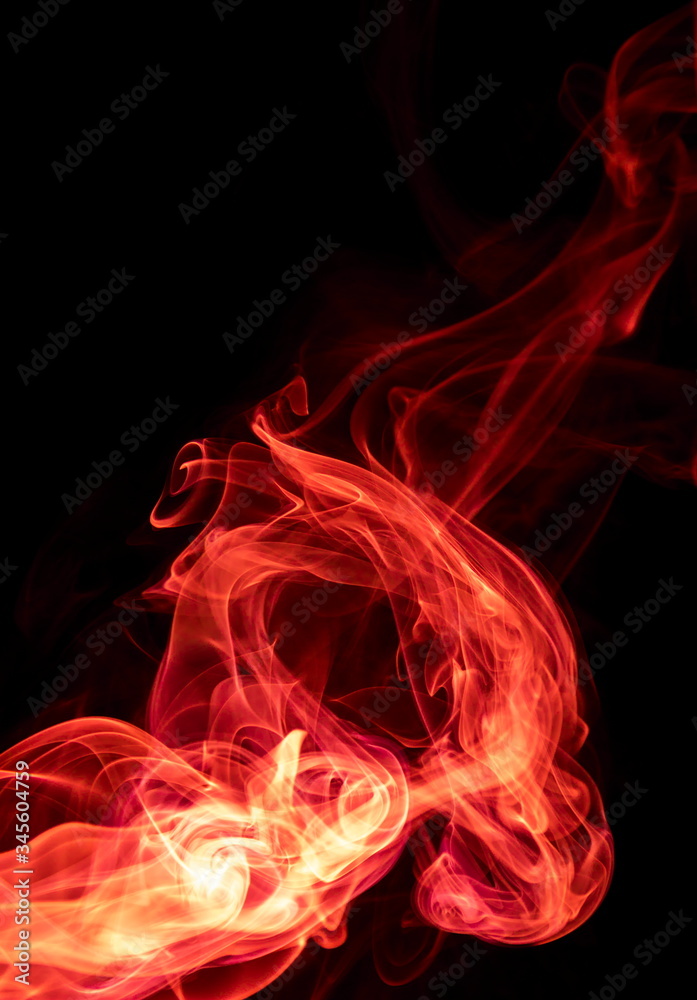 Fototapeta premium Red smoke on black background