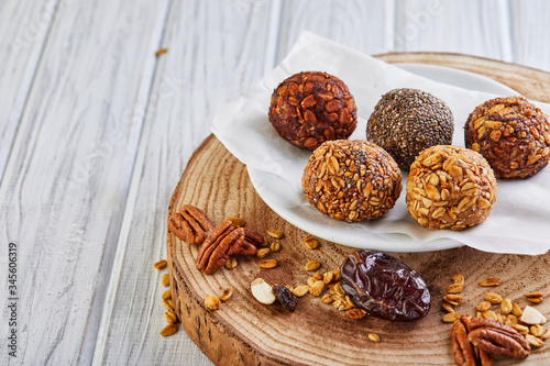 Healthy Organic Energy balls Muesli Bites with Nuts, Cocoa, Chia and Honey - Vegan Vegetarian Raw Snacks or Food.