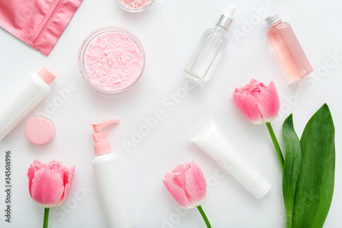 Beauty spa medical skincare make up bath products. Cosmetic bottles, tubes, dispenser, dropper, cream packaging. Cosmetics SPA branding mock-up for bath products background top view flat lay.