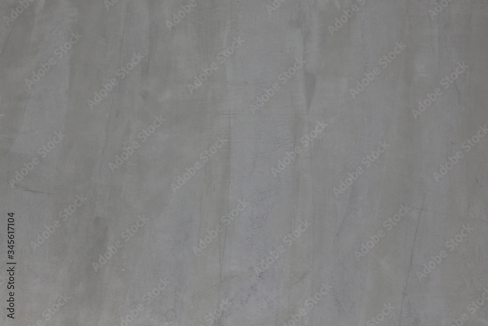Dark grey cement wall with rustic natural texture for abstract background and design purpose