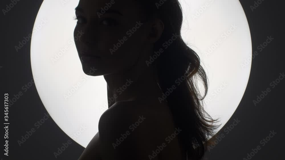 Fine Art Fashion Studio Portrait of Woman at Full Moon